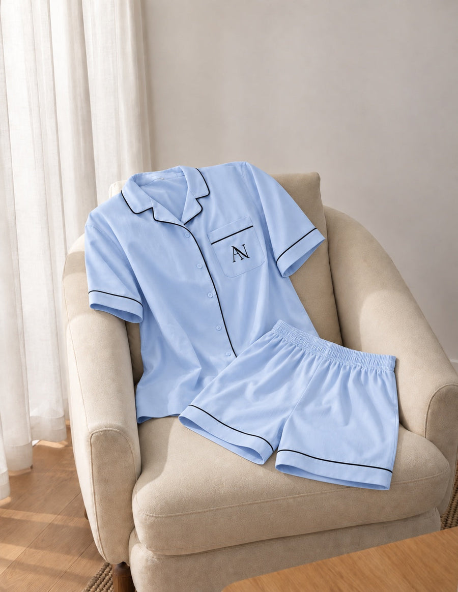 Bamboo Short Pyjama Set in Blue Haze. Complete set with black piping and the AN pocket monogram.