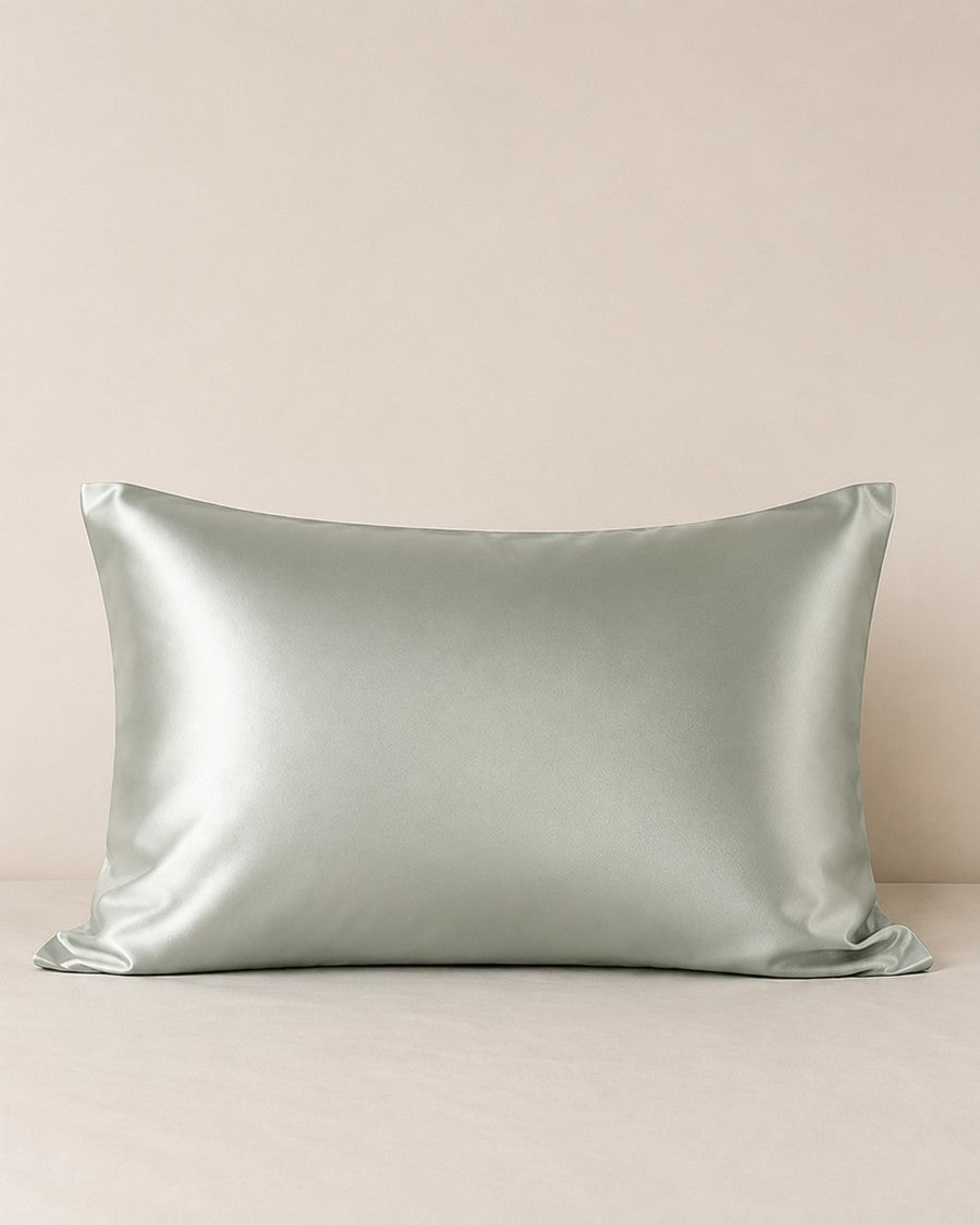 Plain mint mulberry silk pillowcase styled on white bedding